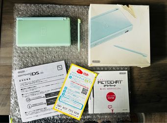 Ice blue ds lite Nintendo with the box tested & working fully functional
