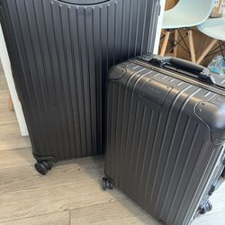 Rimowa luggage set carry on and check in 