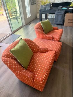 lounge chairs with matching ottomans.