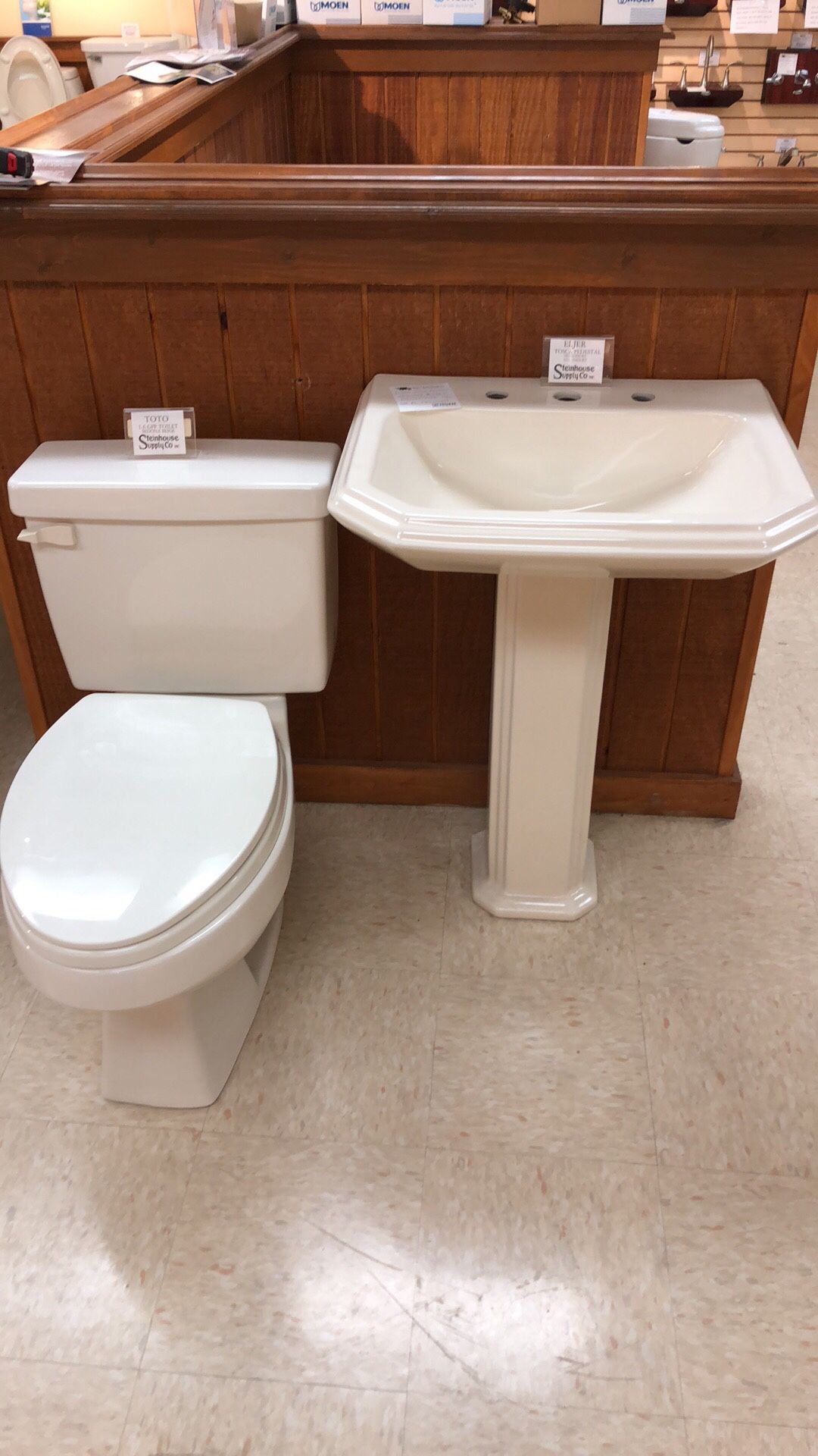 Toto toilet and Eljer pedestal sink