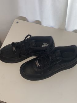 Black Air Force 1’s And Red Vans