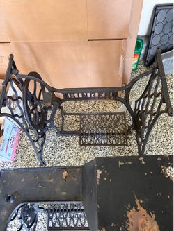 Two Singer sewing machines base antique