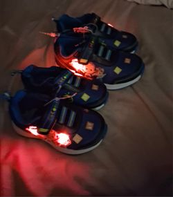 2 Pair Of Tennis Shoes For Kid