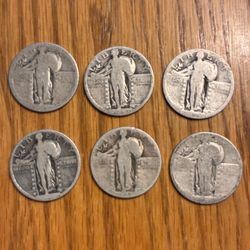 Six Standing Liberty Quarters.  Dateless