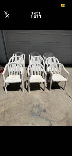 Nine plastic chairs