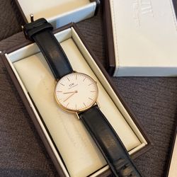 Daniel Wellington Watch In Gold And Black Leather Strap 