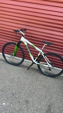 Mongoose 29, 21 speed (3x7), SRAM grip shifts, Shimano derailleurs , 18” frame