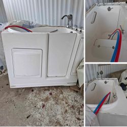 White Walk-In Bathtub with Chrome Fixtures