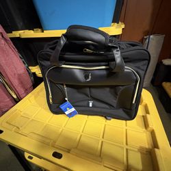 Traveling laptop bag with wheels. New
