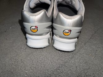Silver and white Nikes DN 8 size 10 run smaller like a size 9.5