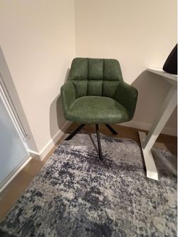 Green swivel chair
