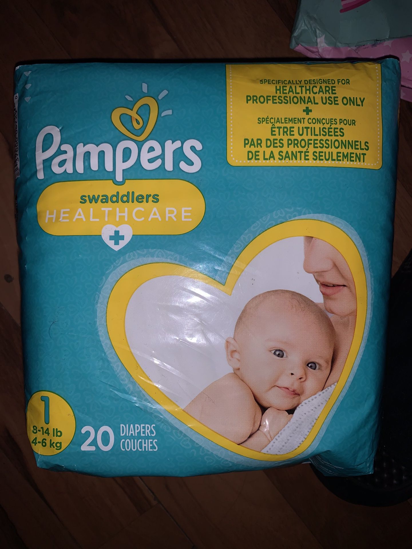 Pampers size 1 pack of 20...... 5 packs of 20 and 2 packs of luvs for 30