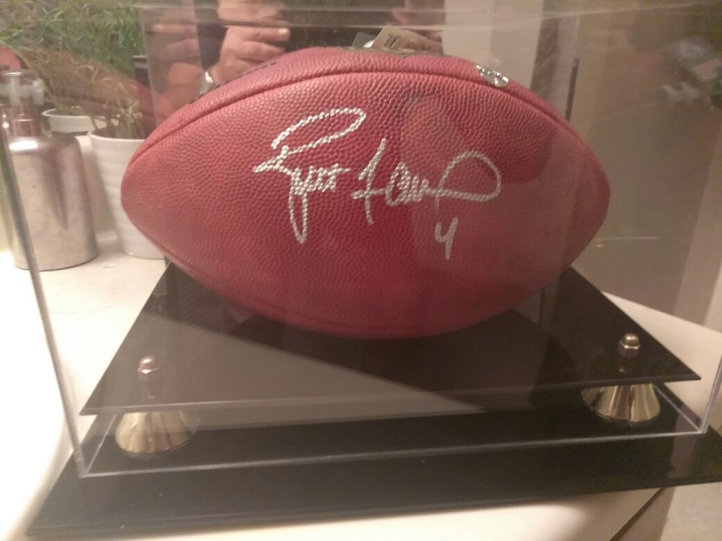 Brett favre NFL signed football in mirrored case with certificate of authenticity and picture of signing serious inquiries only please