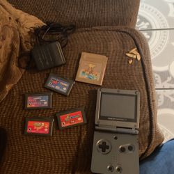 Nintendo Game Boy Advance  Sp Includes The Charger  And   4  Games