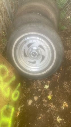 Set Of Four Aluminum Jeep Rims On 15 Inch Tires