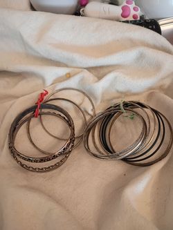 Two sets of bangles bracelets firm price $5 bucks pick up only  865 Ellsworth avenue right off of East Livingston avenue Columbus Ohio 43206 5 minutes