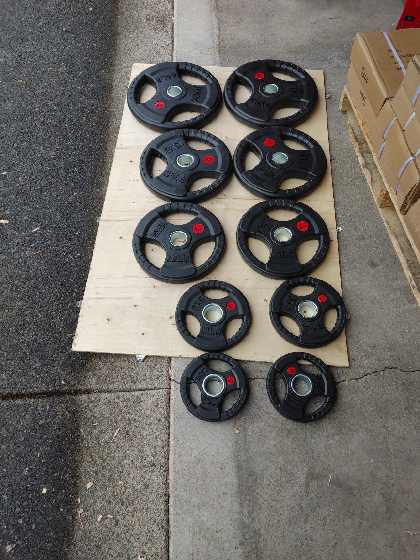 New Rubber Olympic Weight Set 1.00 Per Pound 