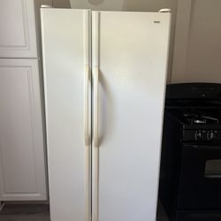 Kenmore side-by-side fridge works great