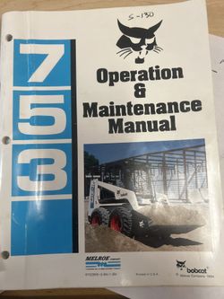 Bobcat 753 skid steer with backhoe attachment