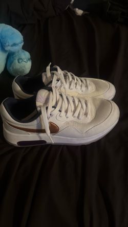 These are Nike Air Max Motif shoes, size 6.5