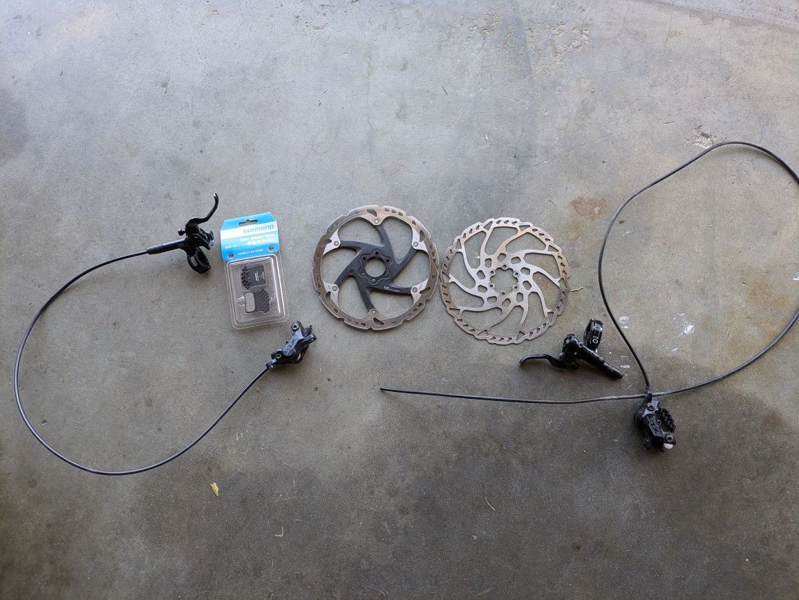 Shimano SLX Brakes And XT rotors and Brake Pads