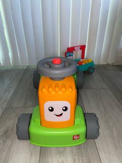 Fisher-Price Laugh & Learn 4-in-1 Farm to Market Tractor Ride-On toy