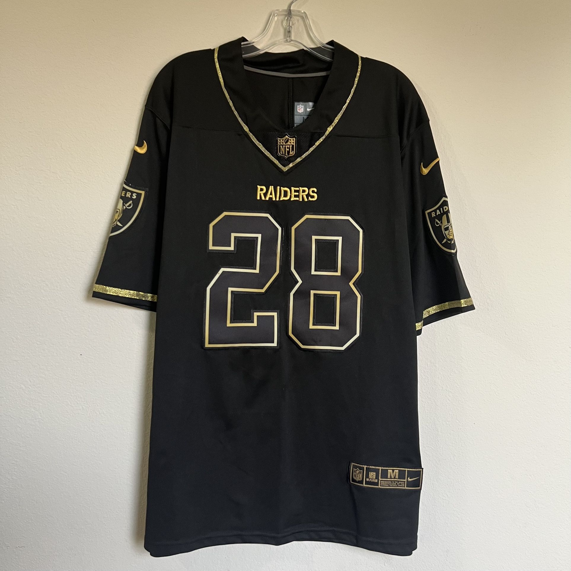 Good and black Raiders Jersey Size Medium