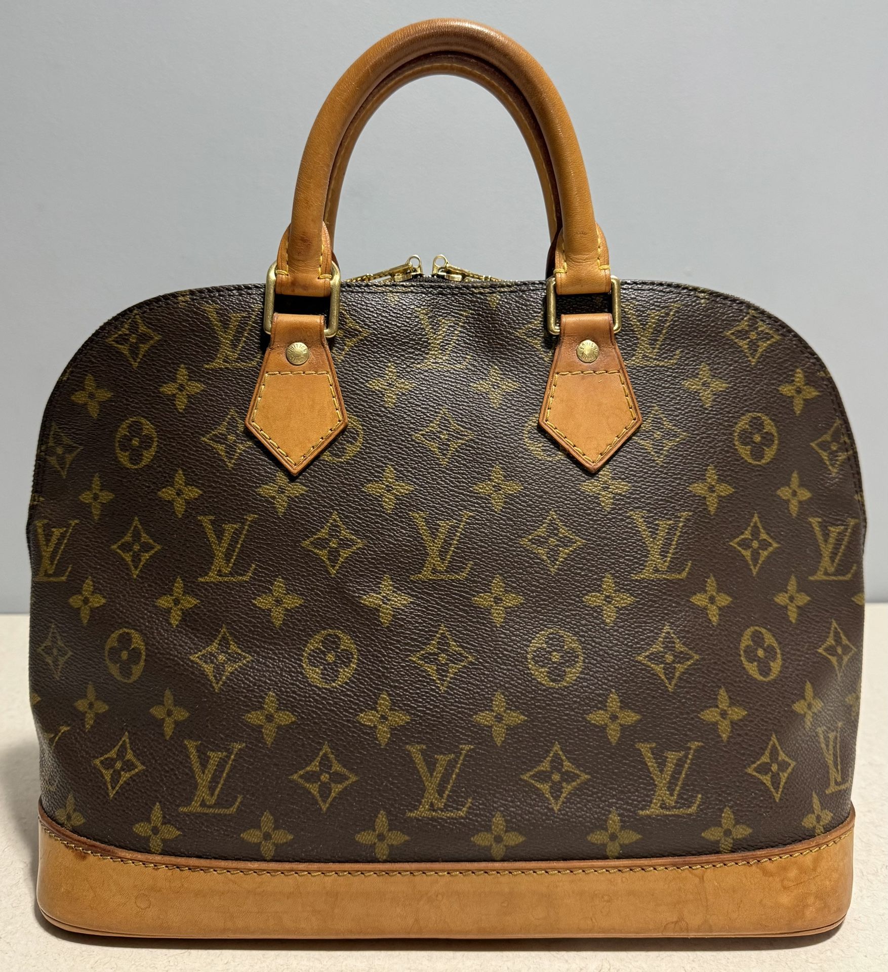 Louis Vuitton Alma PM Monogram Canvas Leather