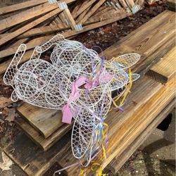 2 White Metal Rabbits 