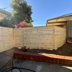 Vinyl And Wood Fence