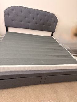 Gray Upholstered Platform Bed Frame with Storage Drawers and mattress frame.