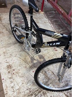 26 in.  Titan Punisher full suspension MTB Bike