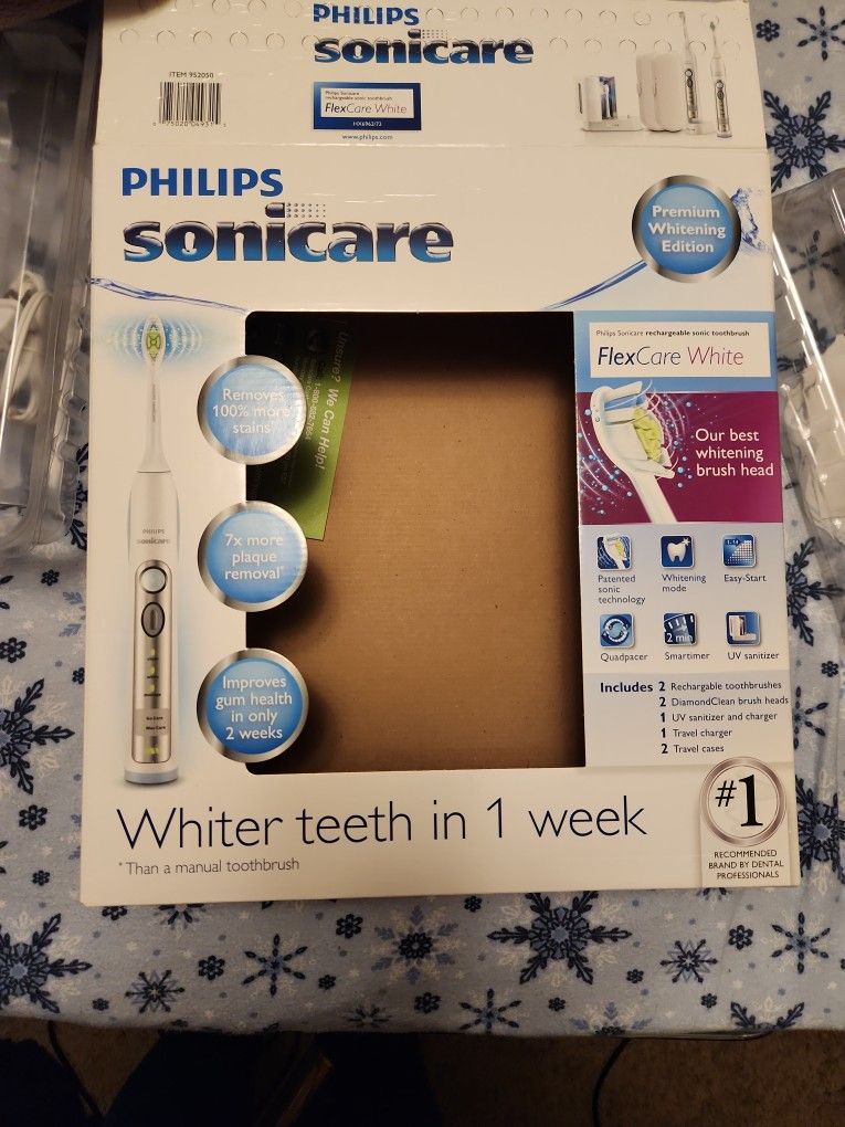READ DESCRIPTION BEFORE ASKING ANY QUESTIONS Brand New Philips Sonicare 4 Cases , 2 Chargers, 1 UV Sanitizer And Charger