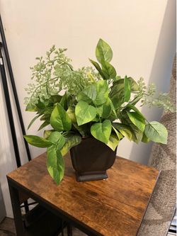 Artificial plant with vase