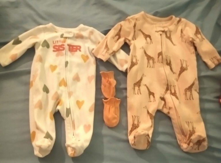 2 Newborn Sleepers With Pink Hand Mitts
