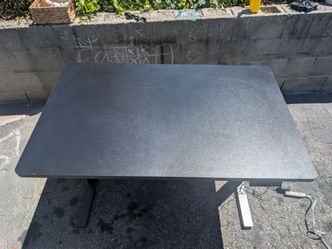 one piece electric adjustable standing desk black