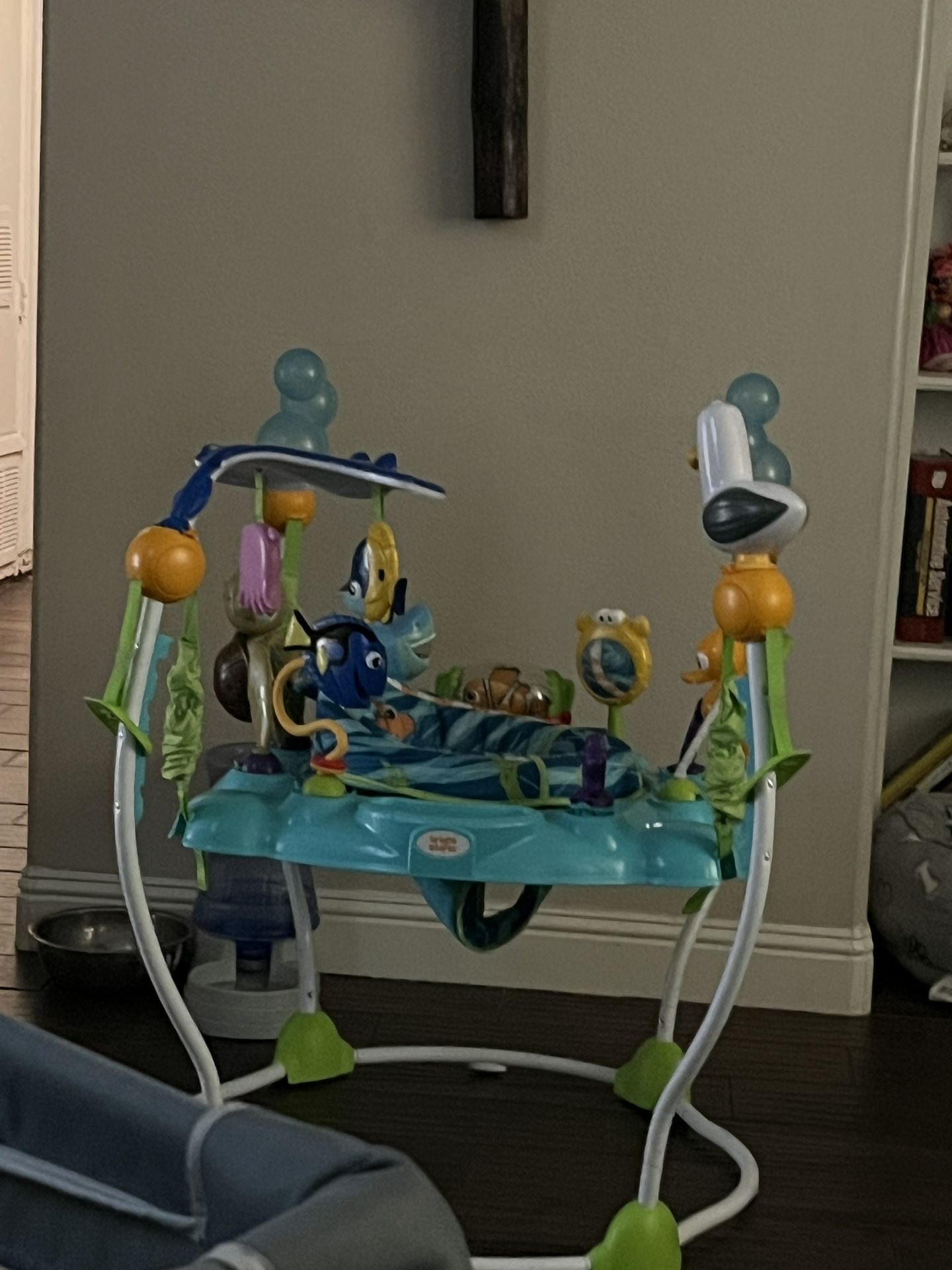 Bright Starts Disney Baby Finding Nemo Sea of Activities Baby Activity Center Jumper with Interactive Toys, Lights, Songs & Sounds, 6-12 Months (Blue)
