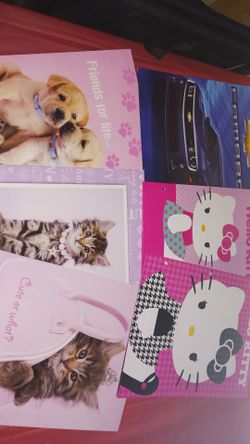 Hello Kitty. And Kitten, Puppies and Camaro pocket Folders $3