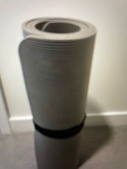 Yoga mat with strap