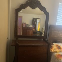 vanity with a mirror.
