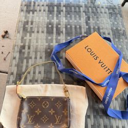 Louis Vuitton Mini Pochette Accessories Purse