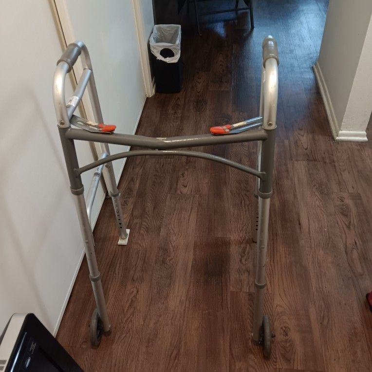 Aluminum Walker. Two Buttons For Folding. Adjustable. 