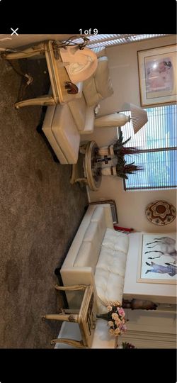 Cream leather sofa set with end tables/coffee table