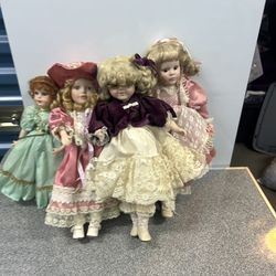 Five vintage collectible porcelain dolls