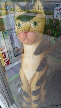 55" wooden kitten.