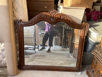 Large solid wood encased mirror