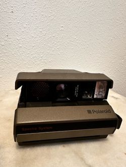 vintage Polaroid Spectra System instant camera.