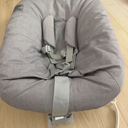 Stokke tripp trapp newborn seat with toy hanger