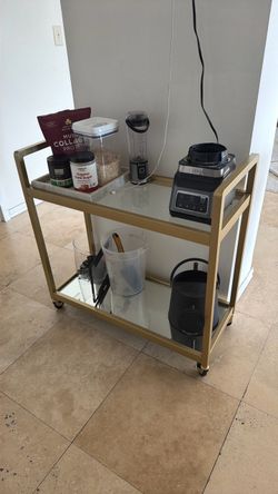 Bar cart in brass