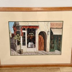 Framed Bistro La Bouille Artwork by Viktor Shvaiko